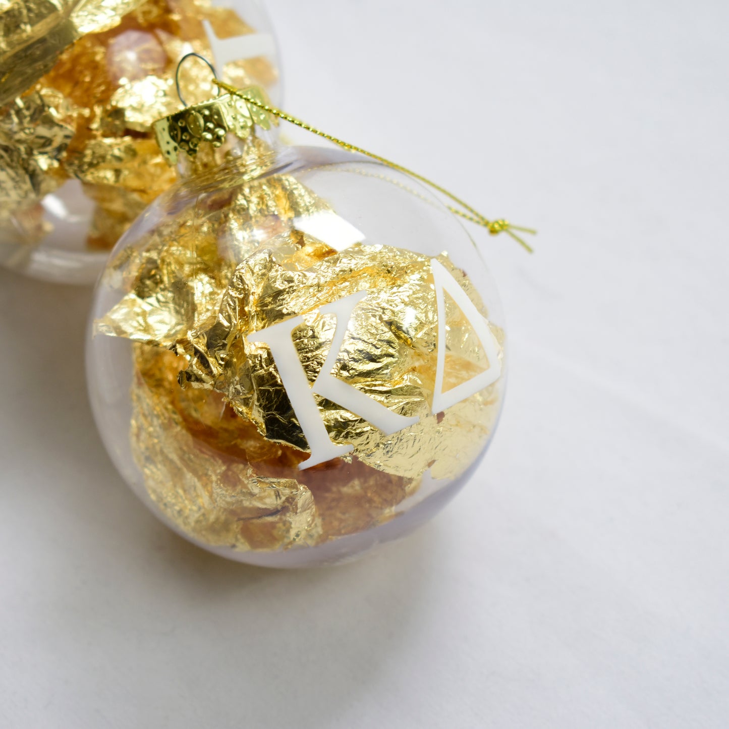 Delta Delta Delta Ornament - Clear Plastic Ball Ornament with Gold Foil